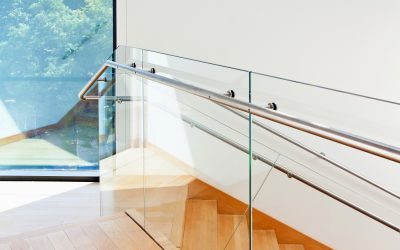 Modern architecture interior with wooden stairs Modern architecture interior with elegant wooden stairs and glass balustrade